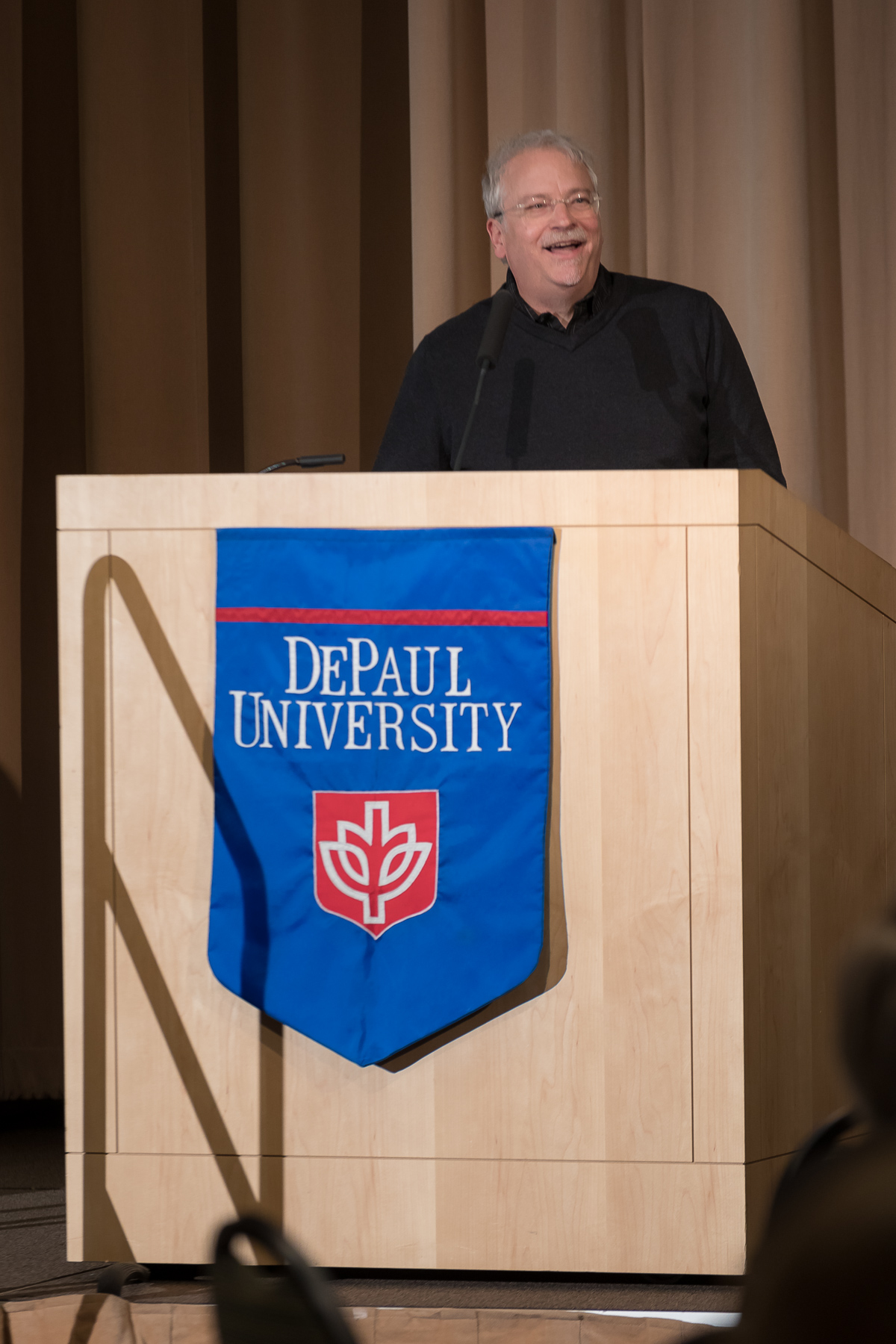 Peter Vandenberg, department chair in Writing, Rhetoric and Discourse, offers his reflections on the past 25 years as DePaul University faculty and staff members are honored for their 25 years of service during a luncheon, Tuesday, Nov. 13, 2018, at the Lincoln Park Student Center. The honorees will have their names added to plaques located on the Loop and Lincoln Park Campuses. (DePaul University/Jeff Carrion)